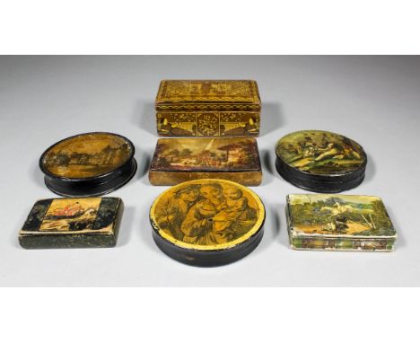 An early 19th Century Continental papier mache circular snuff box, the lid with image of mother, father and child, titled "Le