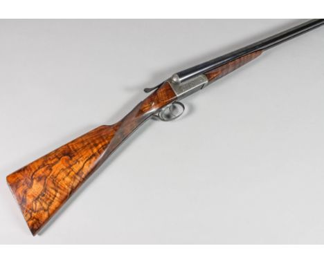 A 12 bore side by side shotgun by Churchill of London, Hercules model, Serial No. 702, 30ins barrels with a Churchill top rib