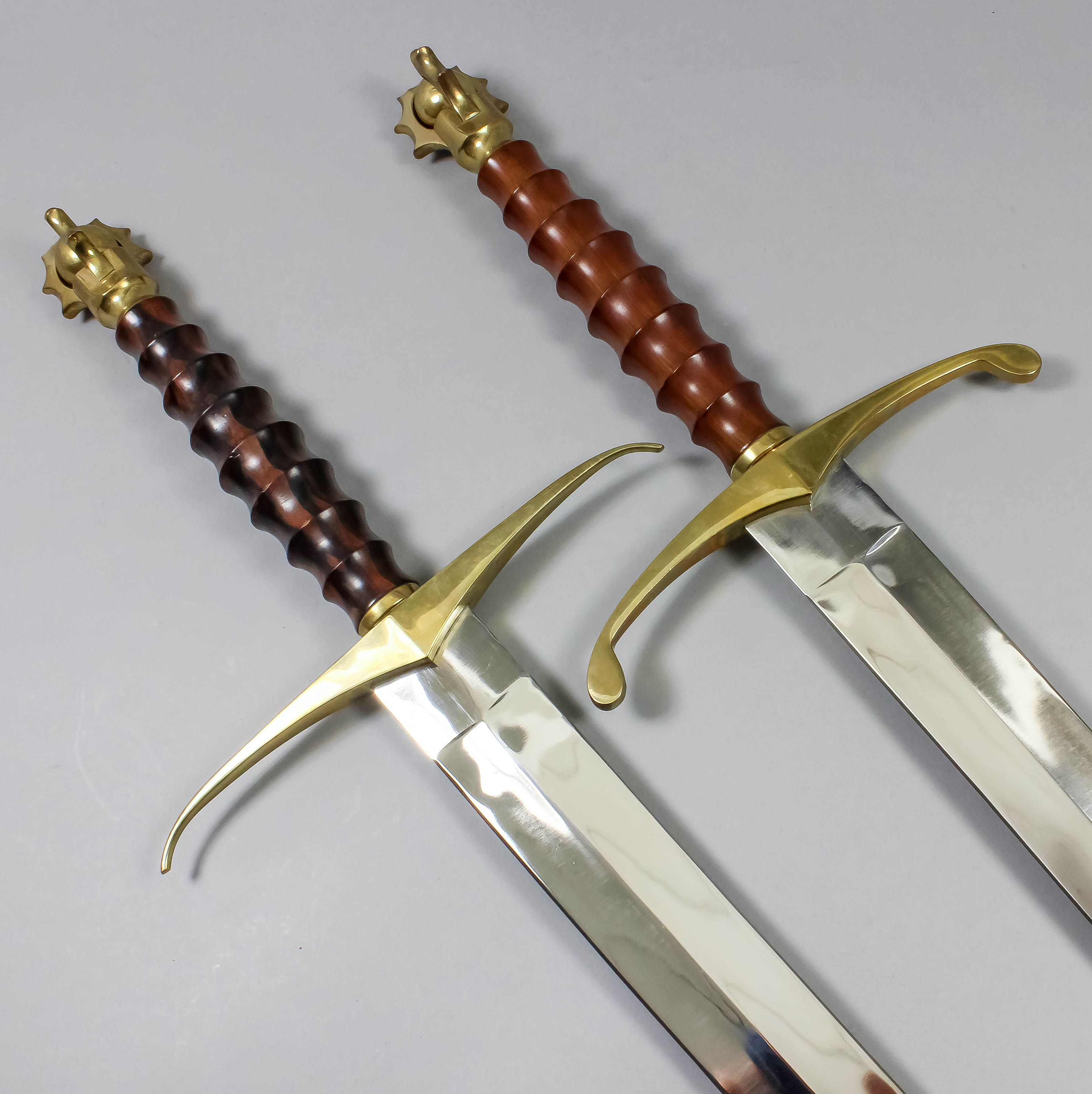 A Pair Of Modern Fantasy Archers Swords Each With 25ins Bright Steel Double Edged Blade Heavy B