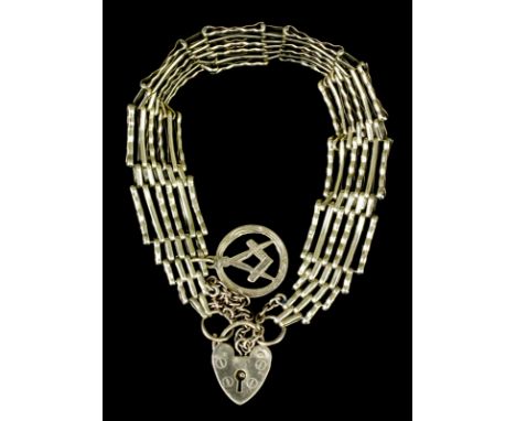 A modern 9ct gold six gate bracelet with padlock pattern clasp and hung with Masonic charm, 175mm overall (gross weight 16 gr