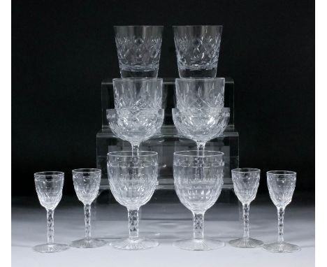 A cut glass part table service, comprising - twelve 4.125ins liqueur glasses, twelve 5ins wine glasses, and five 4.5ins champ