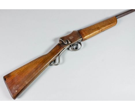A 12 bore single barrel Martini action EG mark 3 police shotgun by W. W. Greener, Serial No. 38015, 25ins blued steel barrel,