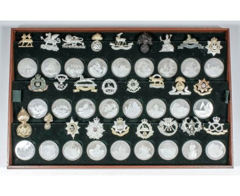 A set of fifty two Elizabeth II silver medallions - "Great British Regiments", each 1.75ins diameter, issued by The Birmingha