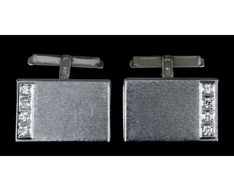 A pair of gentleman's 18ct white gold diamond set cufflinks, the brushed rectangular faces 23mm x 15mm overall, set to one si