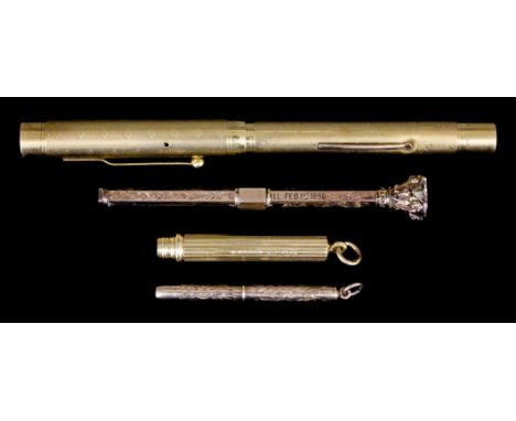 A lady's 18k gold "Swan" fountain pen, the barrel with fine engine turned engraving, 130mm overall, a gold coloured metal dip