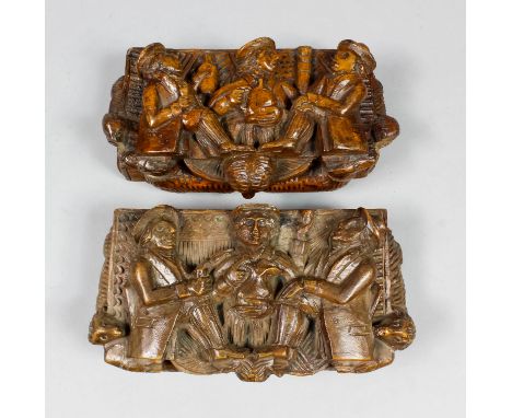 A Victorian Treen "Blind Man" table snuff box carved in high relief, depicting Tam O'Shanter and Souter Johnnie drinking, the