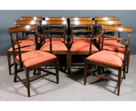 A set of ten late George III mahogany dining chairs (including two armchairs) with narrow curved crest rails with reeded bord