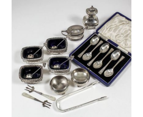 A set of four late Victorian silver rectangular salts with bead mounts, part reeded and fluted bodies, 1.25ins high, by Willi