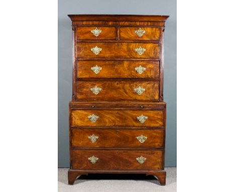 A George III mahogany tallboy, the upper part with plain moulded cornice, fitted two short and three long drawers, with flute