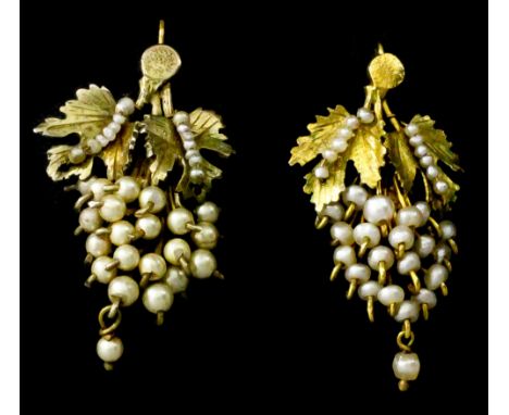 A pair of Victorian gilt metal mounted seed pearl set grape pattern pendant drop earrings (for pierced ears), the finely chas