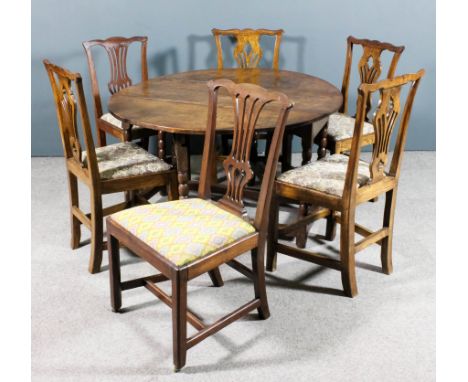 An old oak oval gateleg table with plain top, on bobbin turned supports and block feet, 56ins x 57ins x 28.5ins high, four 19