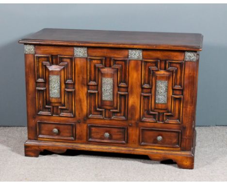 A modern stained wood and metal mounted mule chest of "17th Century" design, the plain lid with moulded edge, the front and s