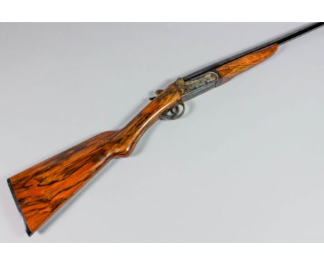 A 16 bore single barrelled shotgun by Webley & Scott, Serial No. 76475, 32ins blued steel barrel, case hardened action, walnu