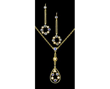 An Edwardian 15ct gold mounted sapphire and diamond pendant necklace, the teardrop frame set with a circlet of three sapphire