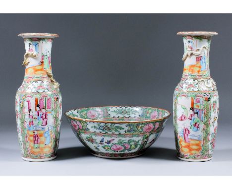 A pair of Chinese "Cantonese" porcelain vases, the necks moulded with dragons chasing the sacred pearl, the whole enamelled i