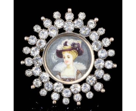An early 19th Century Continental gold and silvery coloured metal mounted brooch, set to the centre with a shoulder-length po