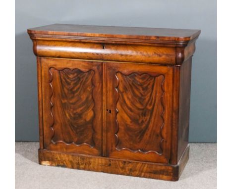 A Victorian mahogany chiffonier with rounded front corners, fitted one frieze drawer with cushion front, shelf under enclosed