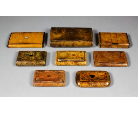 A Victorian burrwood rectangular snuff box with oval mother-of-pearl plaque to lid and with tortoiseshell lined interior, 4.2