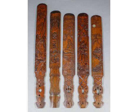 A collection of Japanese and Chinese bamboo carved page turners, including - Guanyin sitting in lotus position, 17.25ins (43.