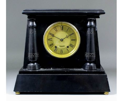 A 19th Century French black marble cased mantel clock, No. 6674, the 5ins gilt dial with Roman numerals and engine turned cen