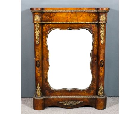 A Victorian walnut marquetry and gilt metal mounted dwarf pier cabinet with bold mask leaf scroll mounts and with floral marq