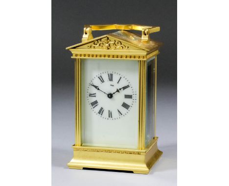A late 19th/early 20th Century French carriage timepiece, the cream enamel dial with Roman numerals, to the eight day single 