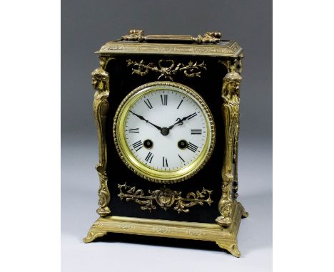 A late 19th Century French ebonised and gilt brass mounted rectangular mantel clock, the 3.5ins white enamel dial with Roman 