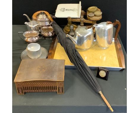 A George V black umbrella, hook handle, yellow metal collar, stamped WH, dated 1923;  A mid 20th century Newmaid Picquot ware