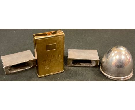 A pair of silver match sleeves, engine turned, 4.5cm long, London 1938;  a gilt metal Consul Amour lighter;  etc 