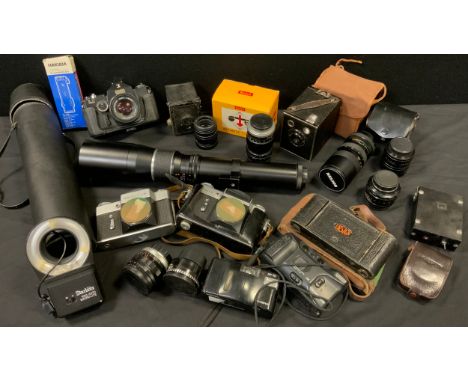 A Zenit E camera;  Zenit -B camera;  Sigma Mark I;  boxed Brownie;  lenses, etc 