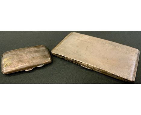 A silver cigarette case, engine turned, another, smaller, 269g, 8.6toz  (2) 