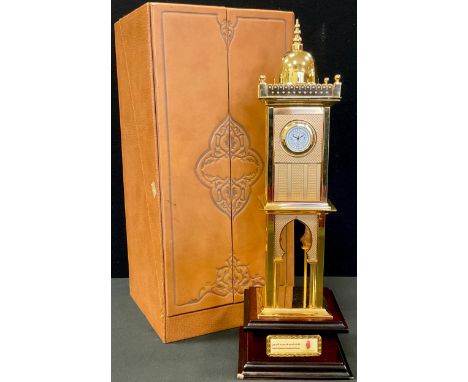 A gilded Arabic presentation architectural tower in the orientalist taste, embossed and tooled calf case 