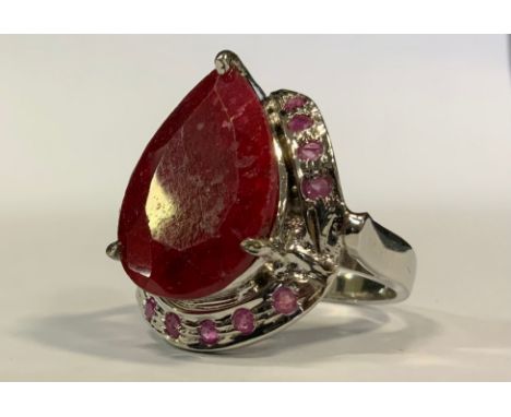 A large ruby cocktail ring, pear cut, 30ct, silver mount 