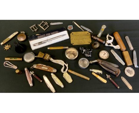 Pen knives;  novelty lighters;  Souvenir of Bridlington studs box;  thimble;   novelty lighter;  compass;  level;  Boy Scout 