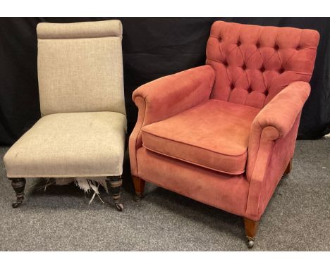 A late Victorian button-back armchair, mahogany legs, brass castors, c.1890, later re-upholstered;  another, Victorian nursin