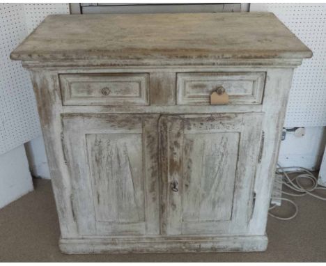 DRESSER BASE, late 19th century Continental painted pine with two drawers over cupboard doors fitted with shelf raised on a p