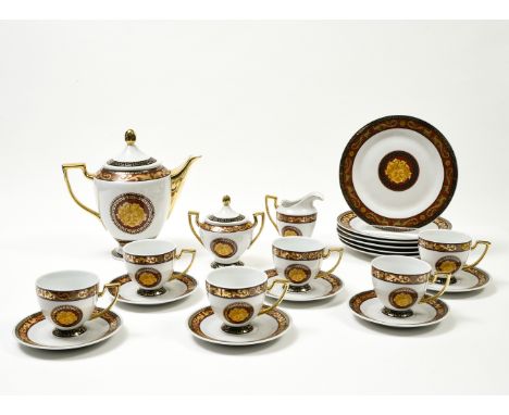 Bacchus serviceLIMOGESPorcelain, composed of a soup tureen with its ladle, six large plates, six soup dishes, six dessert pla