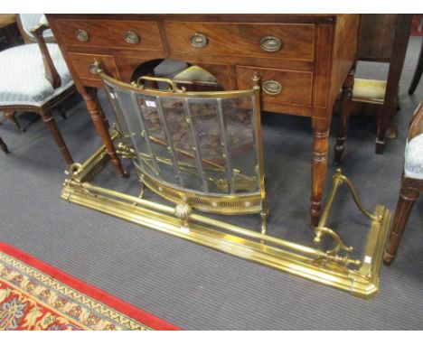 The Brass Fire Furniture - a fire curb, a set of three fire-irons and a cut glass and brass framed bowfronted Firescreen  