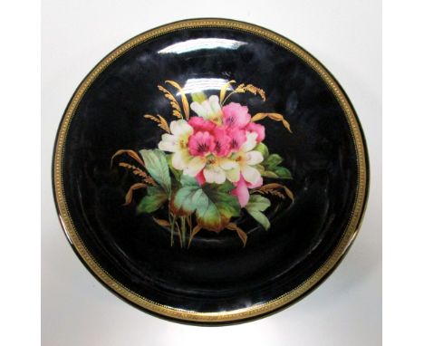 A Royal Worcester dessert service, the black ground bodies painted and gilt with floral bouquets, with beaded gilt rims, comp