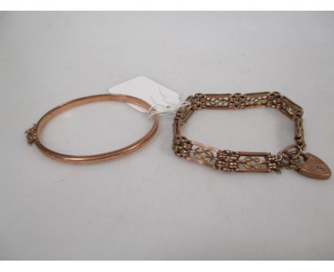 A fancy gate link style bracelet with padlock clasp stamped 9 together with a plain hinged bangle stamped 9, gross approx. 26