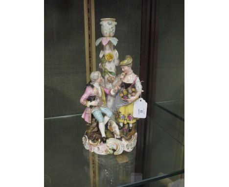 A Carl Thieme of Potschappel figural candlestick  