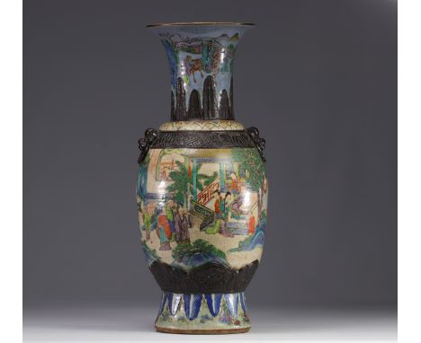 A nanking porcelain vase decorated with characters from 19th century. This baluster-shaped vase features characters discussin