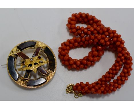 A NICE SCOTTISH AGATE CELTIC STYLE BROOCH PIN TOGETHER WITH AN ORIENTAL CORAL NECKLACE WITH 18 CARAT GOLD FASTENING     