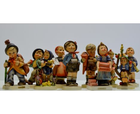 A COLLECTION OF 10 VARIOUS GOEBEL / HUMMEL FIGURINE ORNAMENTS     