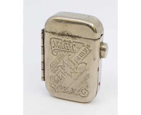 A late Victorian early Edwardian Magic pocket lamp lighter, engraved front, size approx 60x40mm  NB: Please note we do not po