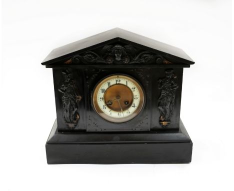 A late 19th/early 20th century slate mantel clock with figural design, with key. Untested, some chips, nibbles etc.