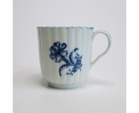A Worcester ribbed coffee cup, gillyflower pattern.Circa 1770Diameter 6.5cm, height 6.5cmCondition ; small chip to top rim, n