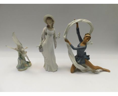 A Nao figure of a dancing lady, Nao herrrings in flight along with Lladro figure of a Edwardian lady.