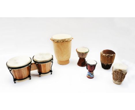 A collection of bongo drums.