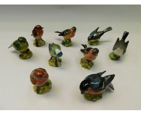 Beswick - nine ceramic bird figures inc. Blue Tit, Robin, Chaffinch etc, couple with minor chips.